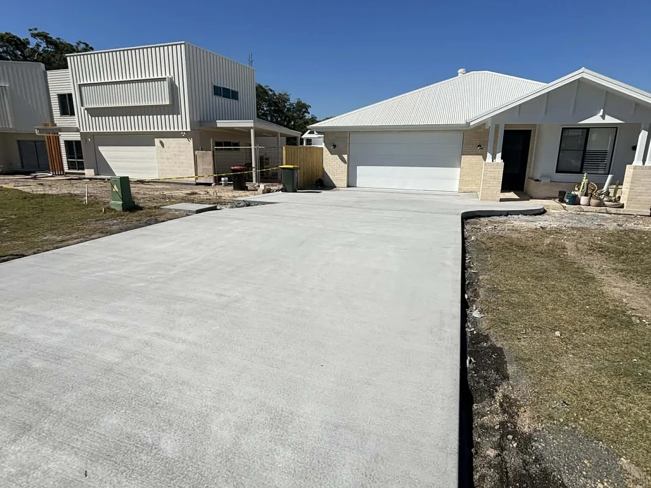 Completed concrete driveway at a newly built Central Coast home